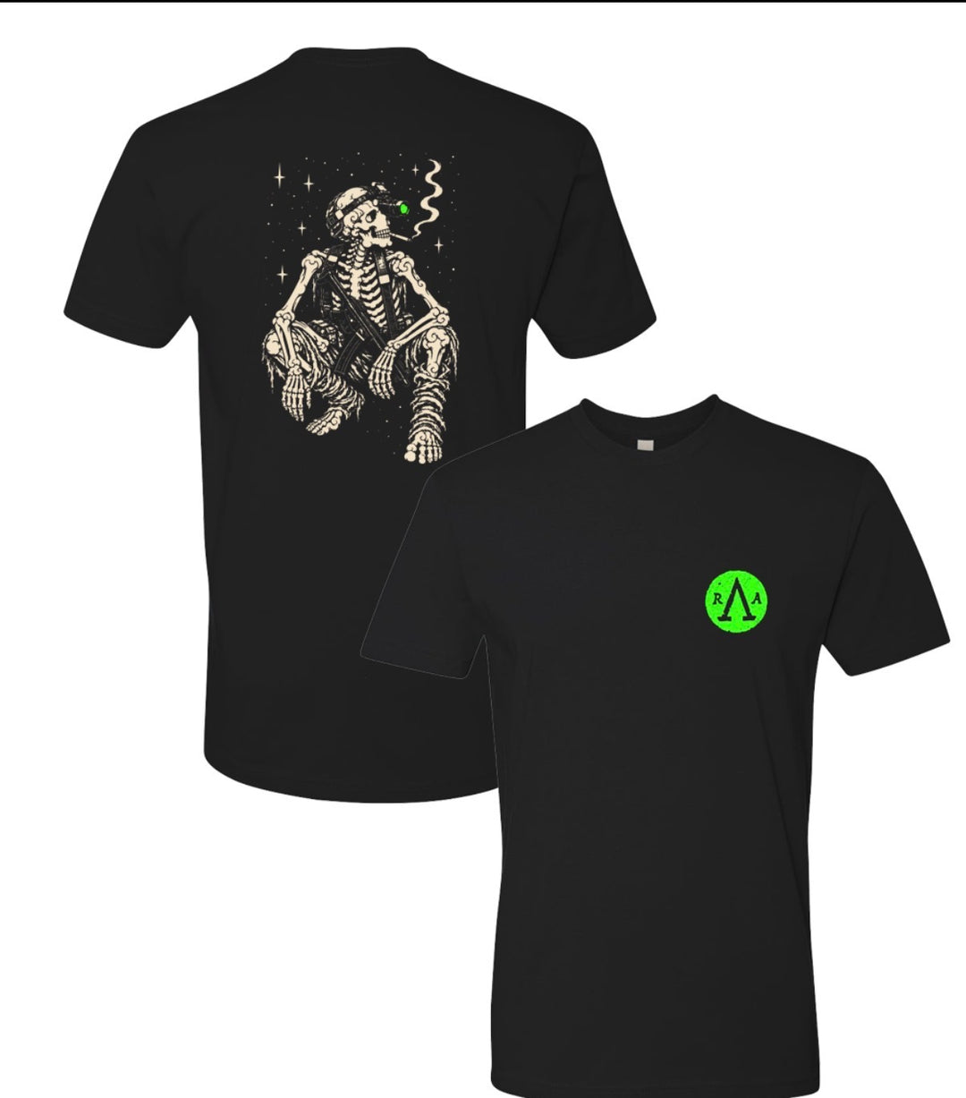 Black Night Moves tee mockup with green chest emblem and skeleton back graphic
